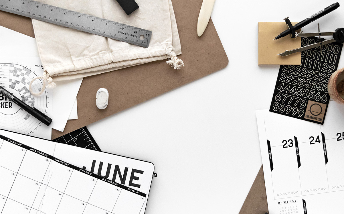 Flatlay of stationery supplies and printables by The Pacific Line